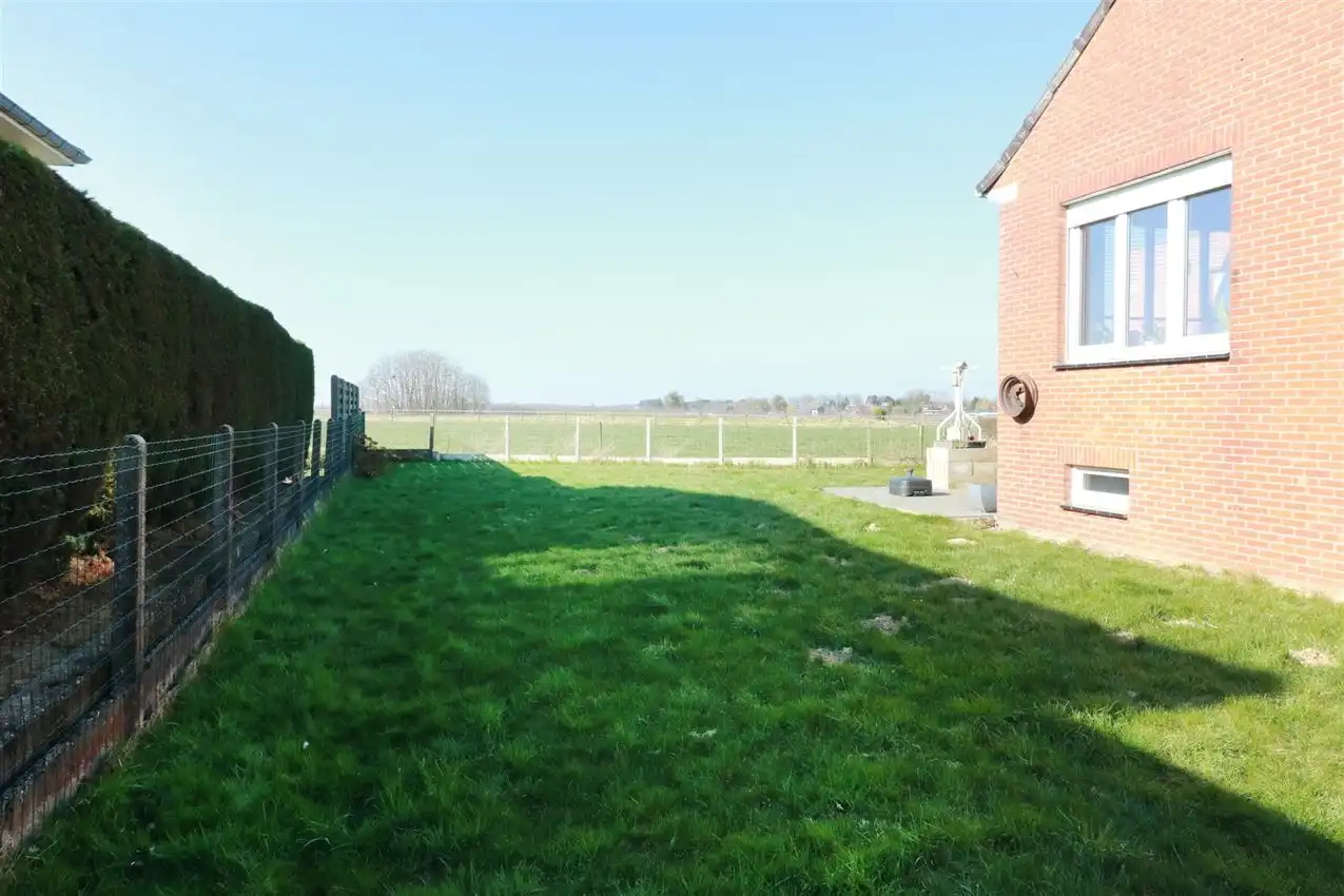 Gusting gelegen woning met 2 slpk, garage en tuin foto 36