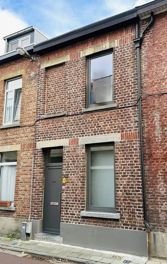 Charmante, instapklare gezinswoning met tuin in Groenstraat, Heverlee foto {{pictureIndex}}