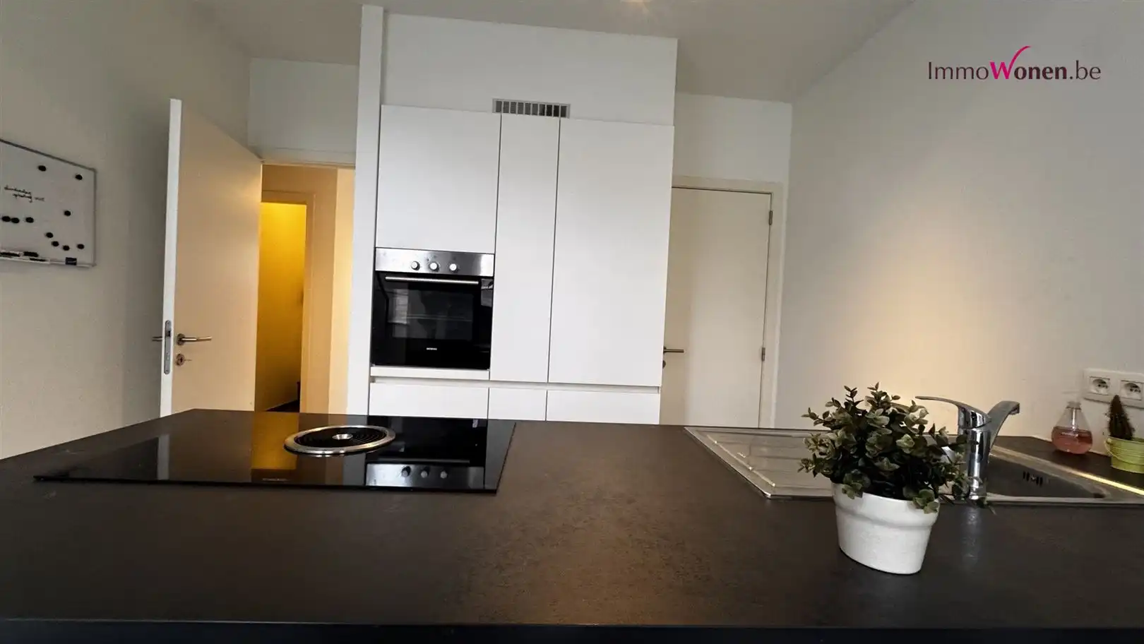 Energiezuinige halfopen woning met tuin en autostaanplaats foto 34