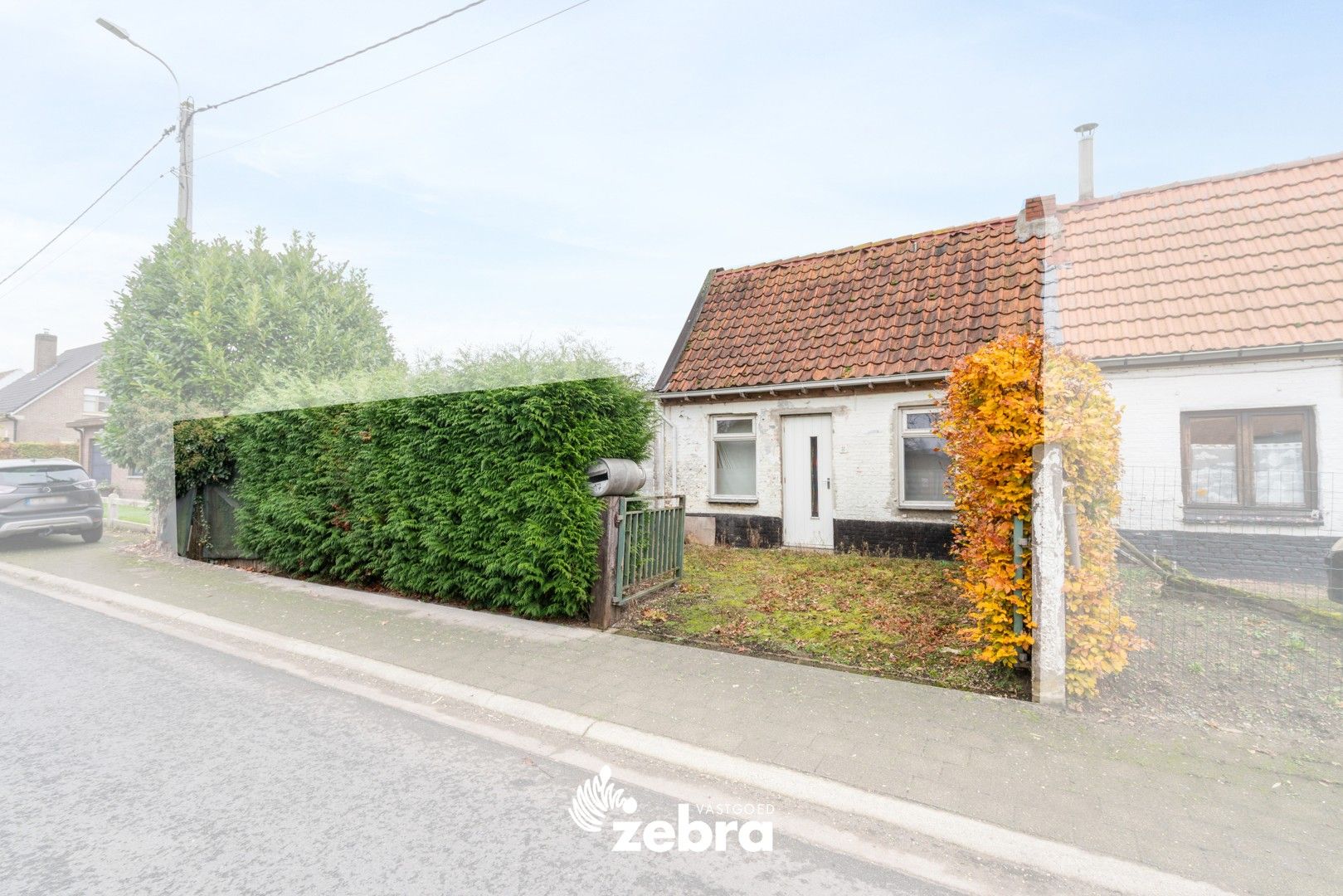 Te renoveren woning met garage op een rustige ligging te Beervelde (Lochristi)! foto 2