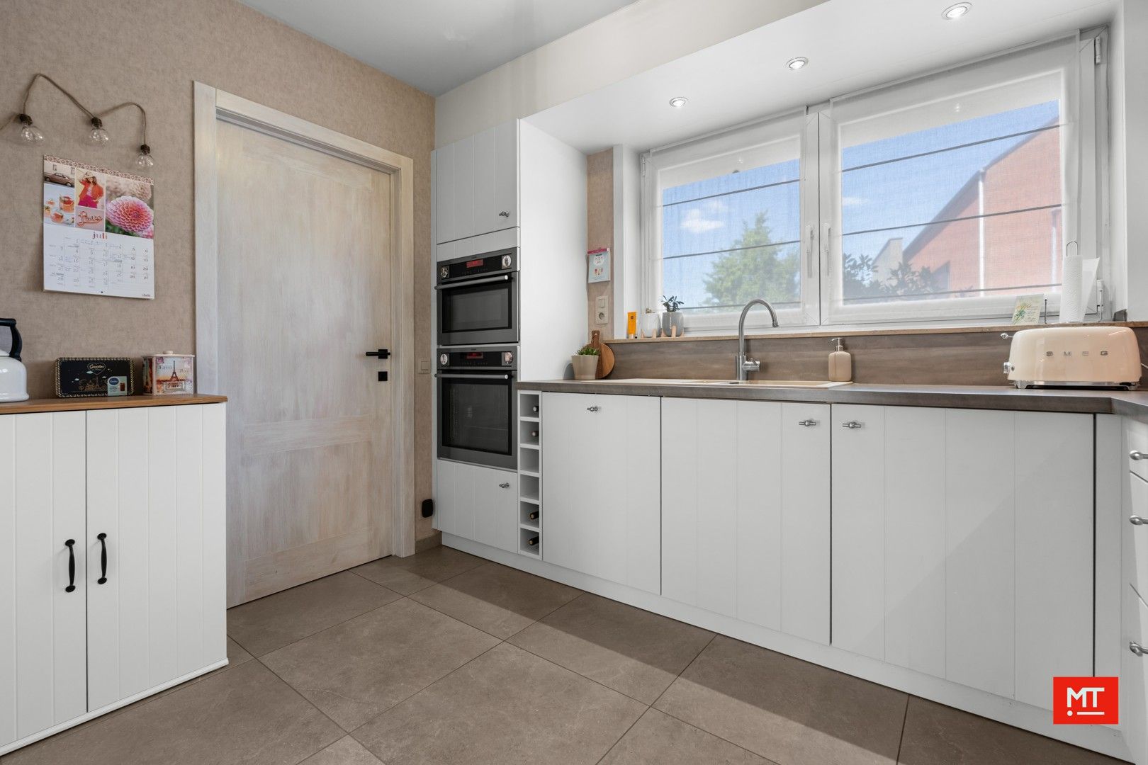 Instapklare woning met 3 slaapkamers, tuin en garage, gelegen in een rustige wijk in hartje Zonnebeke foto 5