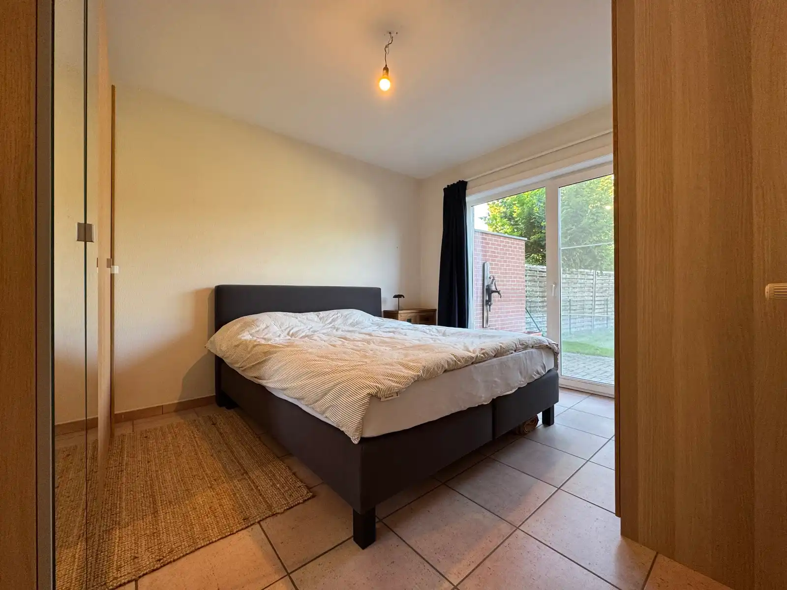 Gelijkvloers appartement met ruime privé tuin en garage foto 4