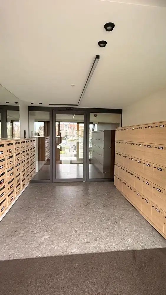 Appartement met twee slaapkamers en terras te huur aan het Molenweideplein te Lanaken foto 4