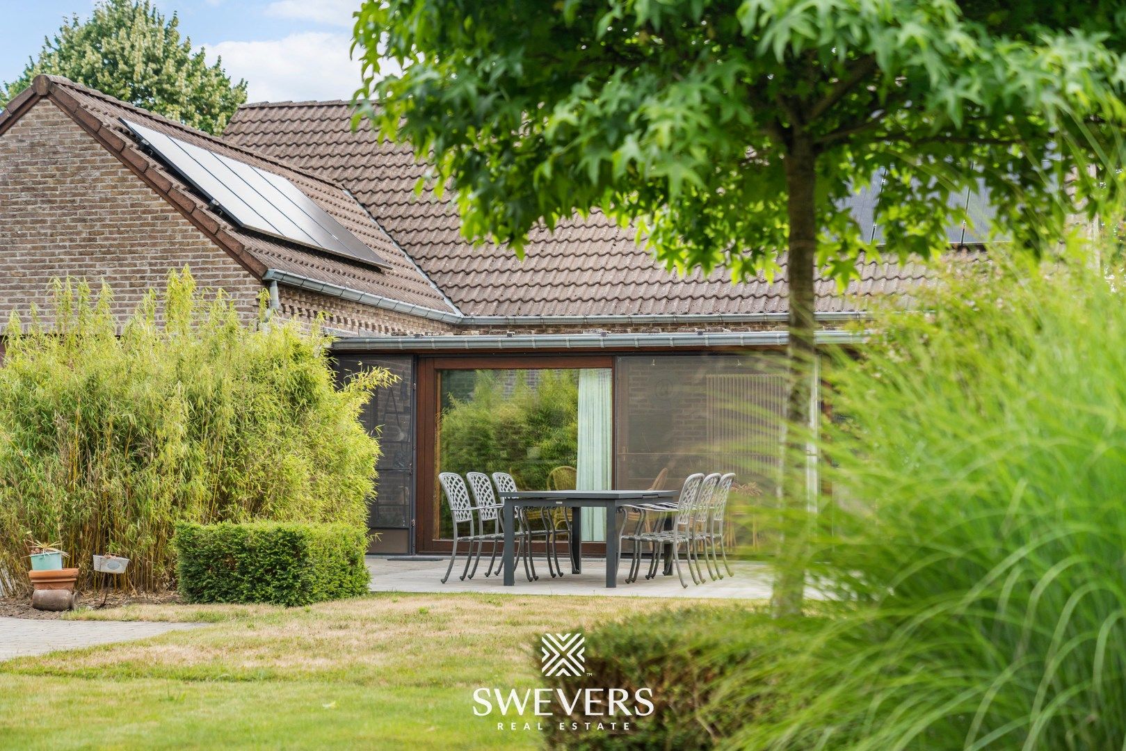 Rustig gelegen ruime woning met 3 slaapkamers op een zonnig perceel van 9a foto 36