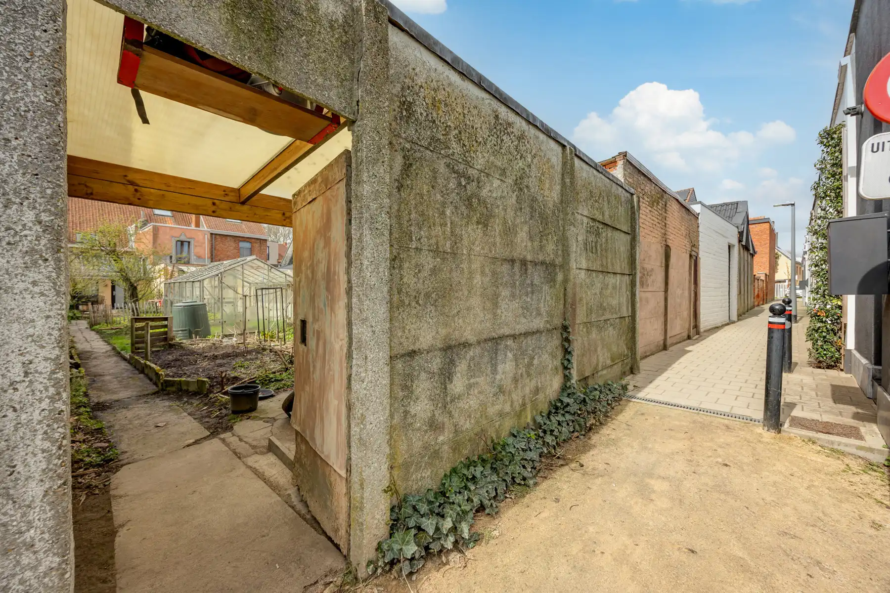 Stadswoning op een perceel van 230 m² met toegang achteraan de tuin. foto 18