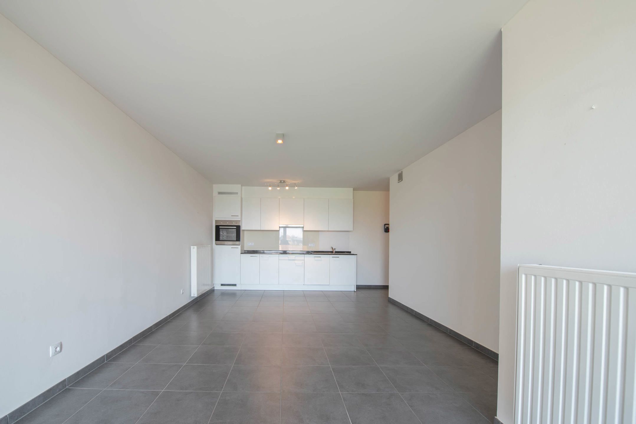 Serviceflat met autostandplaats & kelderberging foto 7