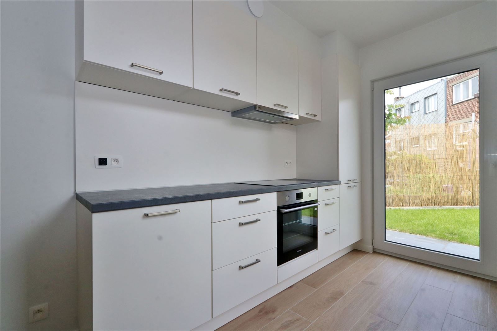 Duplex met 3 slaapkamers, 2 badkamers, tuin en staanplaats foto 10