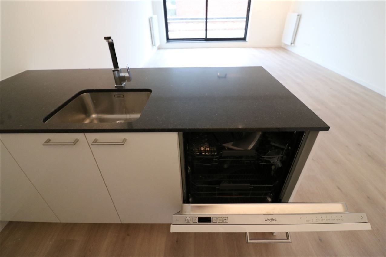 Gelijkvloers appartement met 2 slpk., terras en autostaanplaats foto 24