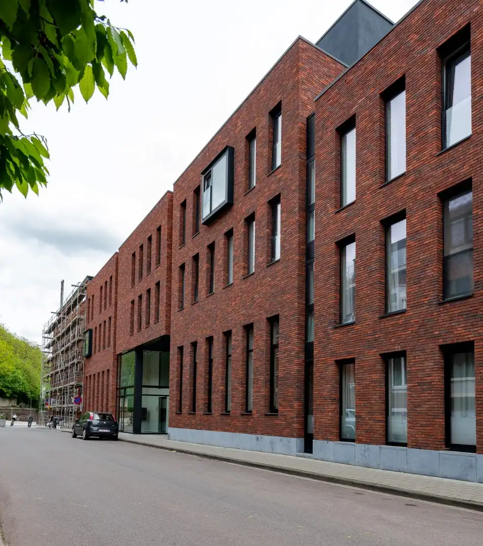 Instapklare en energiezuinige studentenkamer met privébadkamer in hartje Leuven foto {{pictureIndex}}