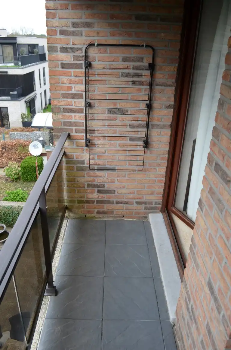 Ruim appartement met twee slpk's, terras en garage in centrum Beverlo foto 6