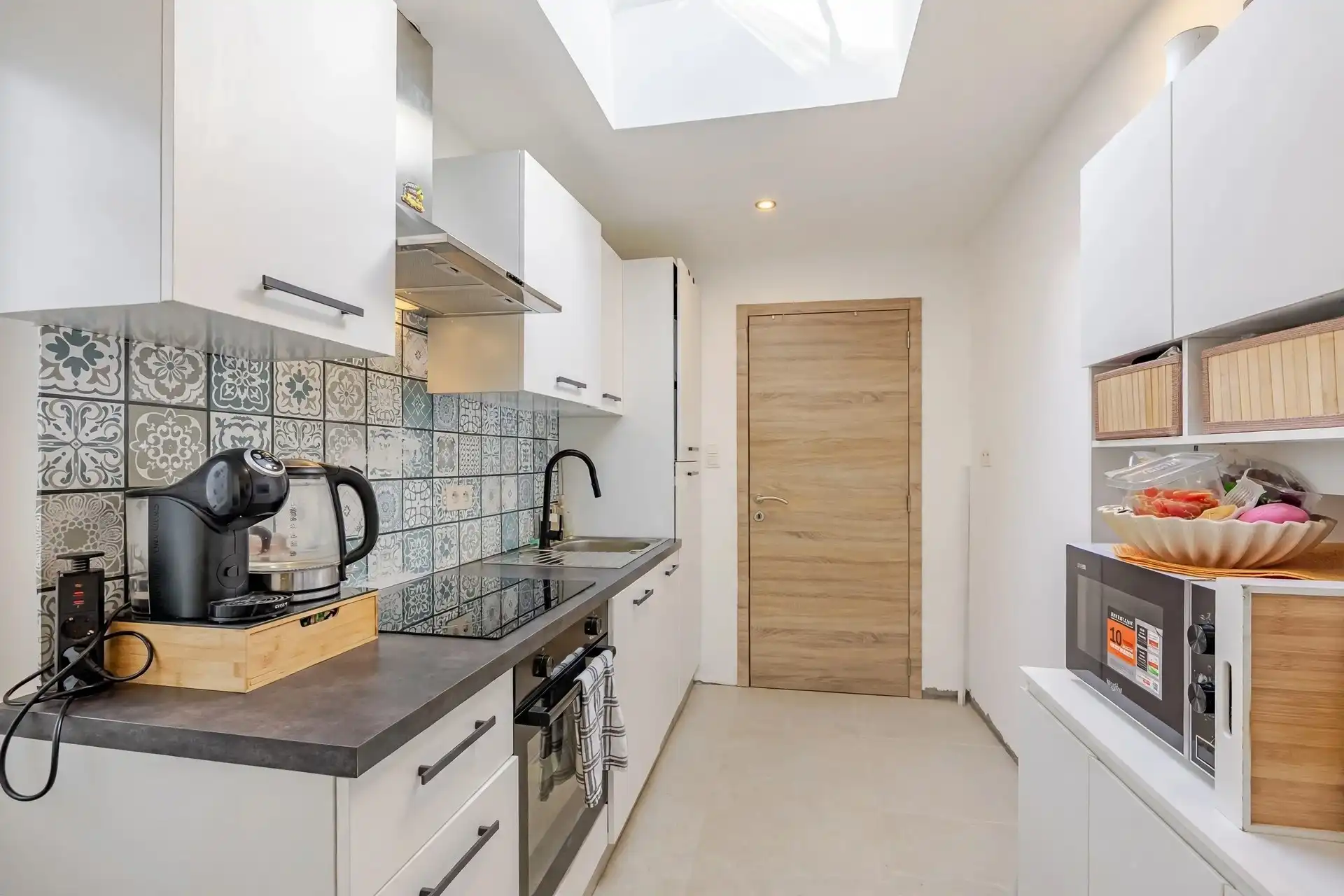 Prachtig gerenoveerde woning met 2 slks en buitenruimte foto 8