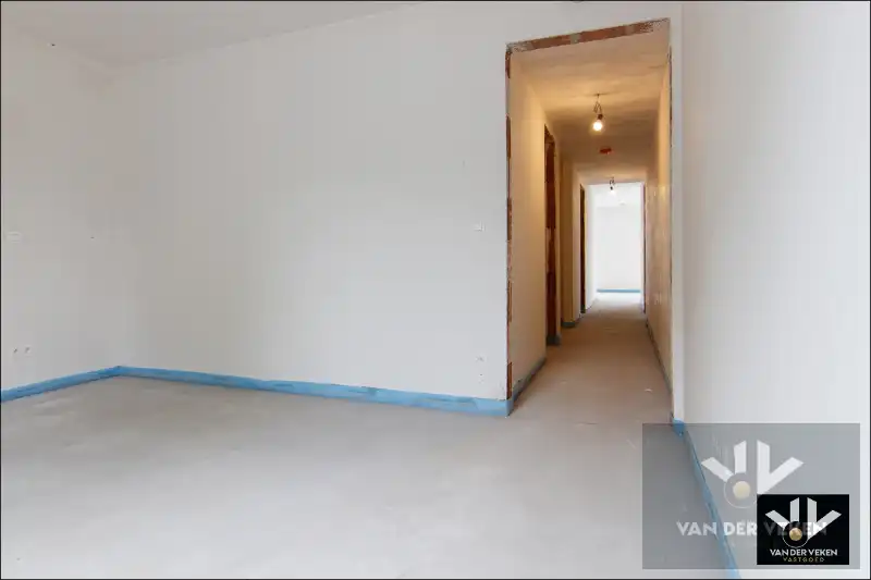 Ruim gelijkvloers nieuwbouwappartement met 2 slaapkamers, terras en een mooie tuin op een goed bereikbare locatie! foto 5