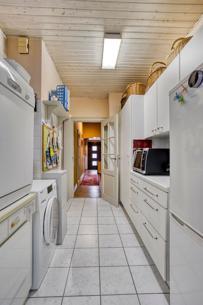 Vlakbij Boekenberg Park gelegen bel-étagewoning met 3 slks, tuin en garage. foto 20