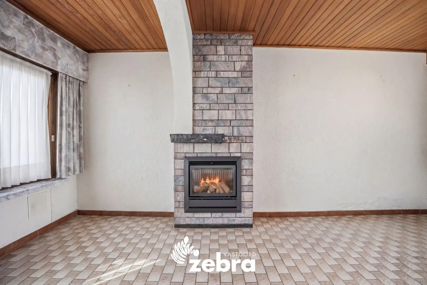 Op te frissen woning met veel potentieel, tuin en garage nabij het centrum van Tielt! foto 3