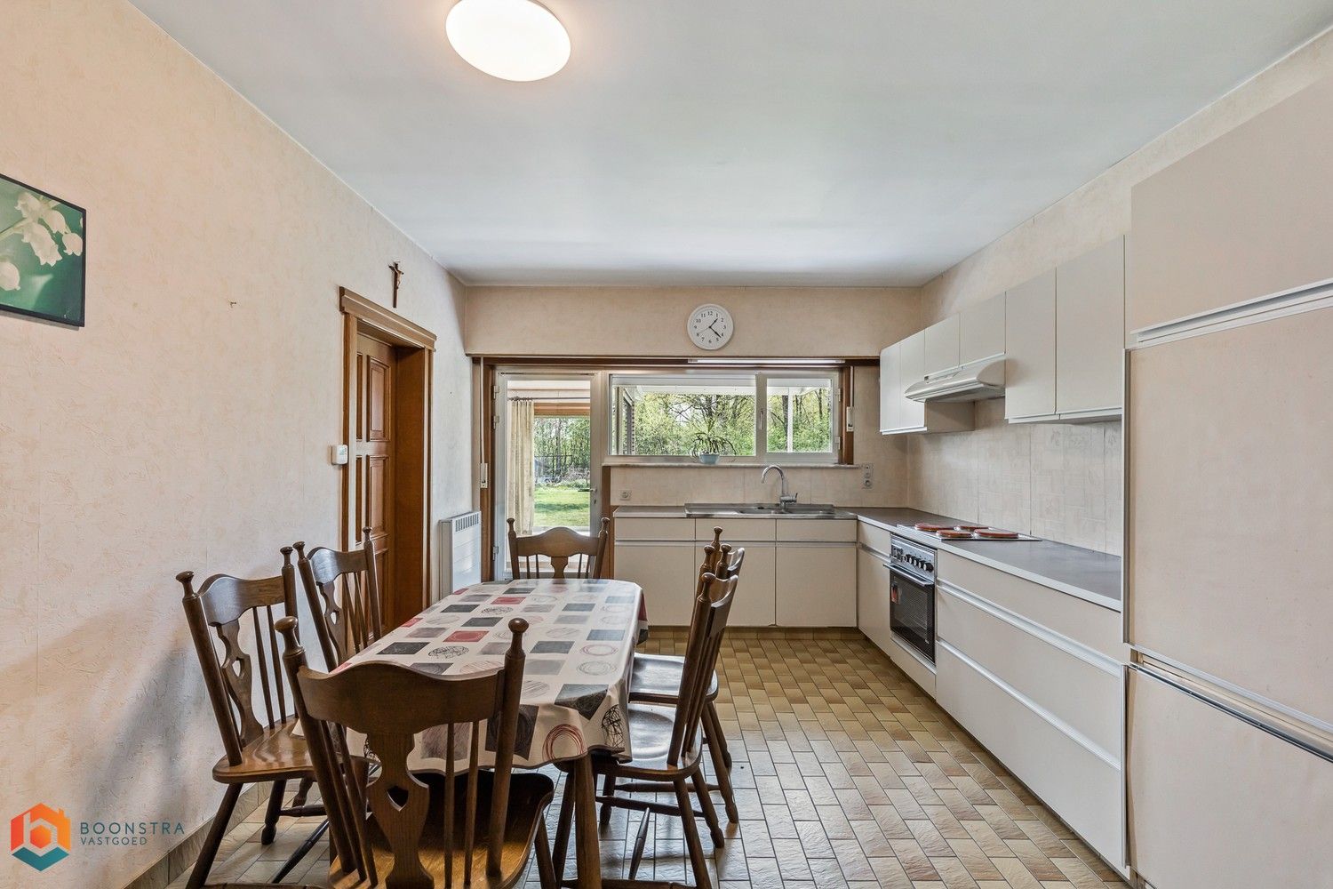 Te renoveren woning met 3 slpkrs op een ruim perceel foto 10