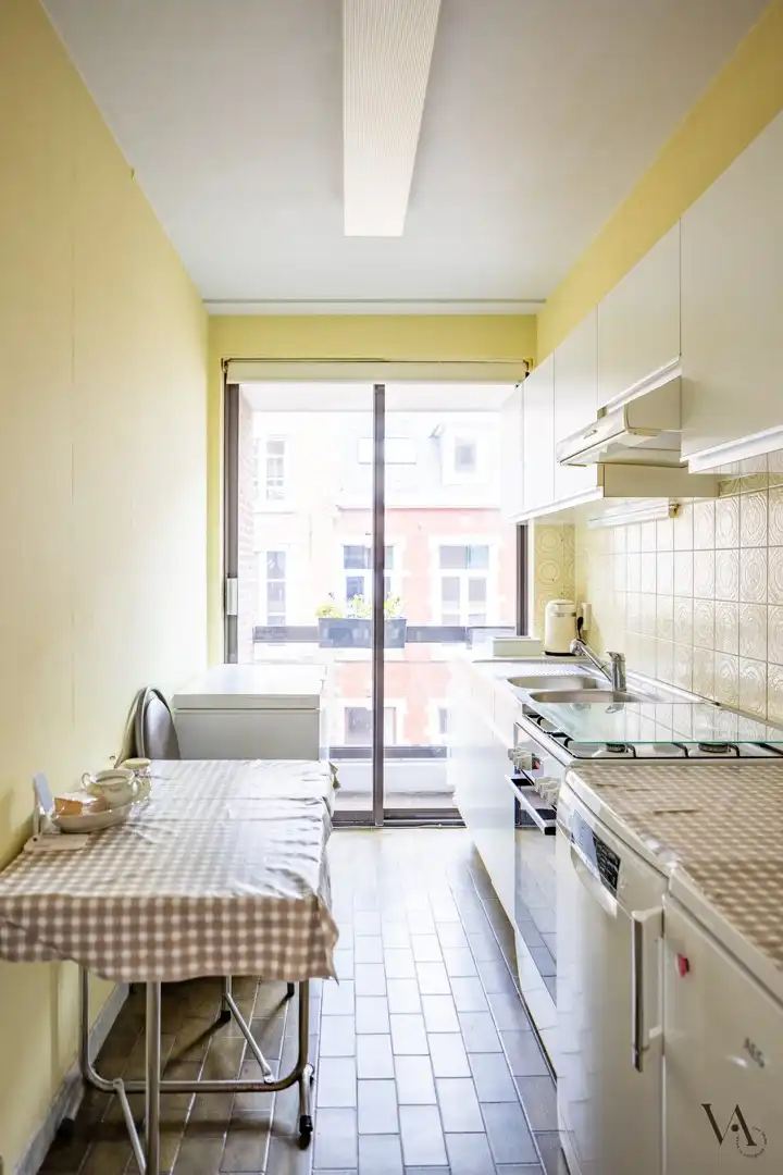 Gezellig en centraal gelegen 2-slaapkamerappartement in Tienen foto 4