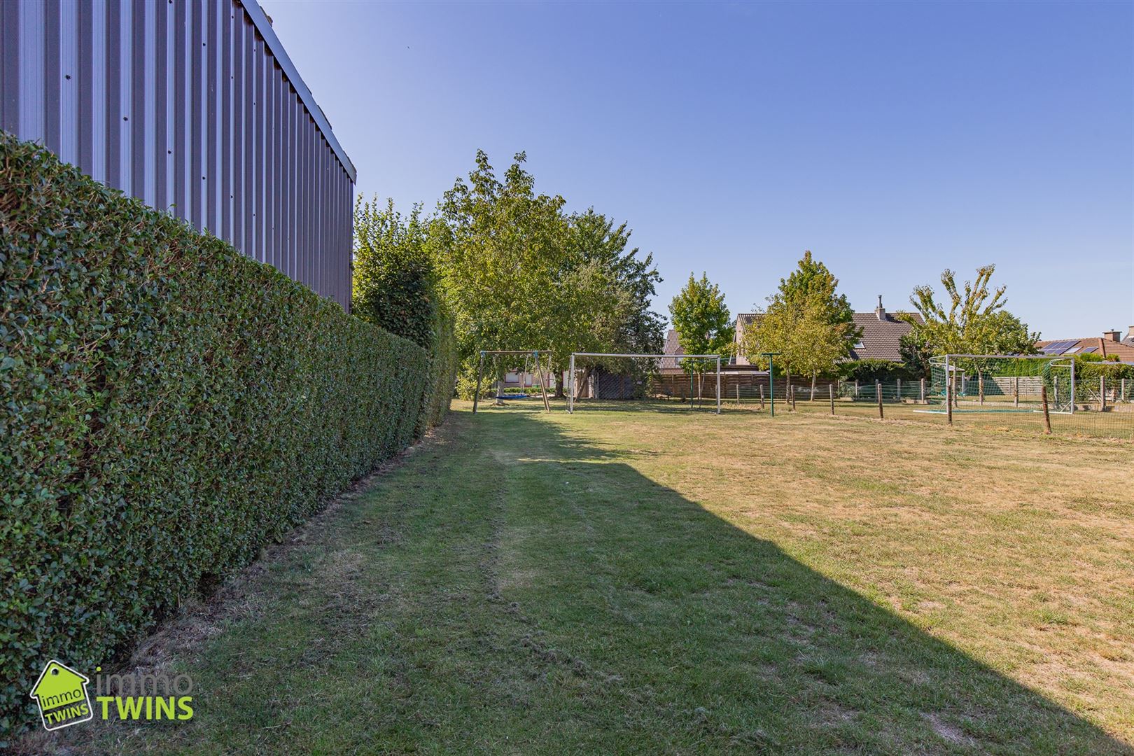 Instapklare halfopen bebouwing op royaal perceel van 13a 12ca met diepe tuin en zonnepanelen | BEZOEKDAG 20/09 op afspraak! foto 16