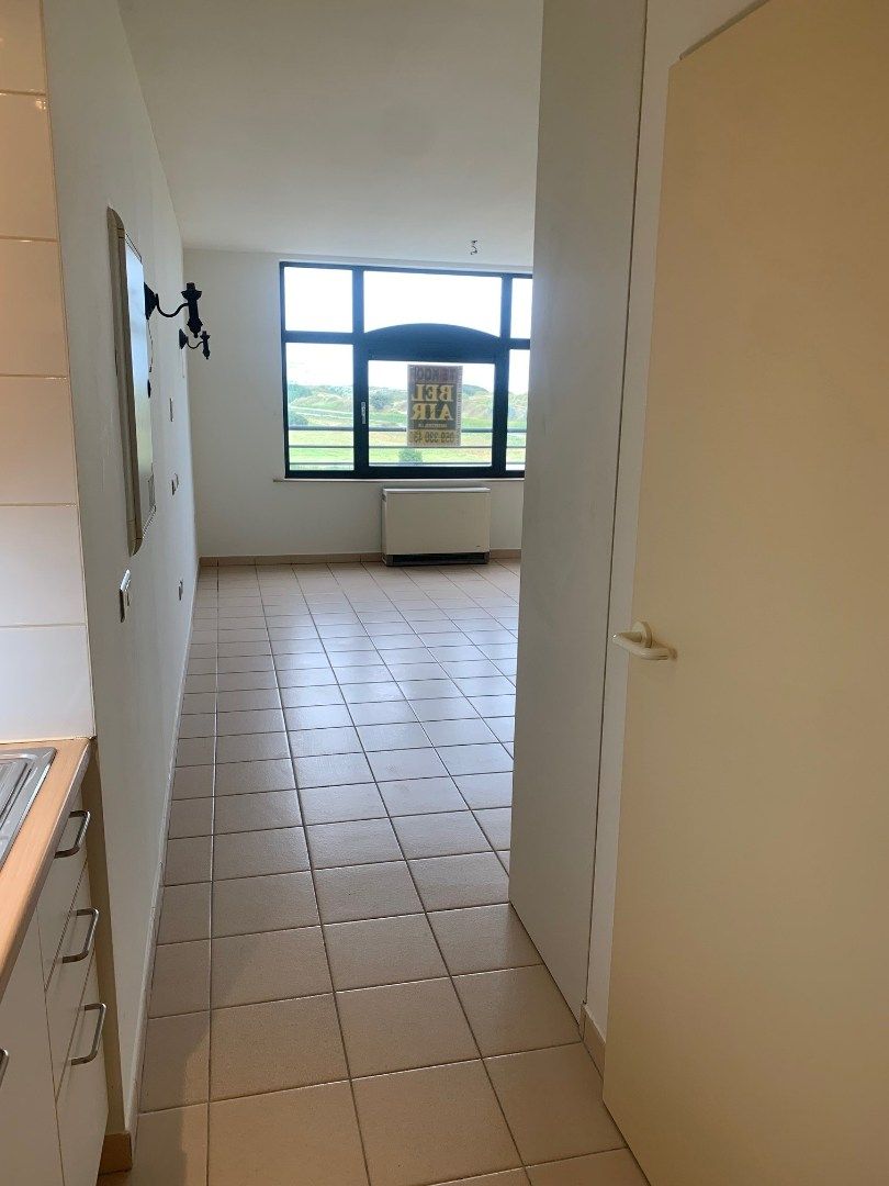 Niet gemeubelde studio met prachtig zicht op polders, strand en duinen foto 2
