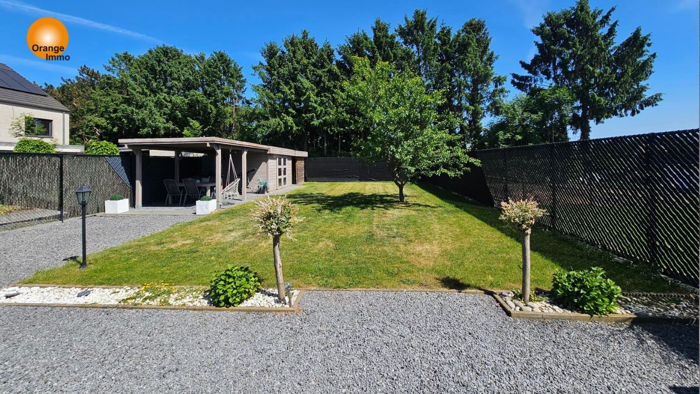 Knappe moderne woning met een mooie tuin  in Dilsen-Stokkem. foto 10