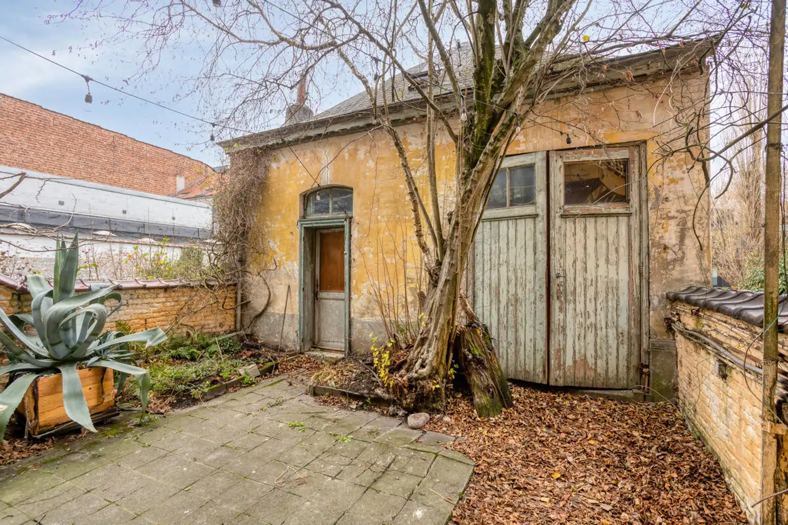 Commercieel gelijkvloers met achterliggend werkplaats foto 10