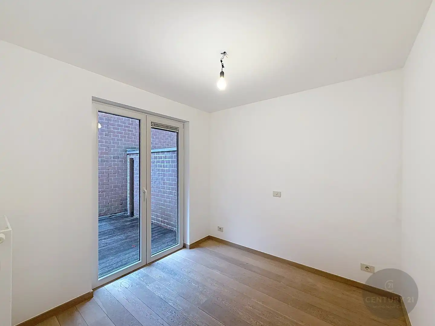 2 slaapkamer appartement met koer en garagestaanplaats foto 5