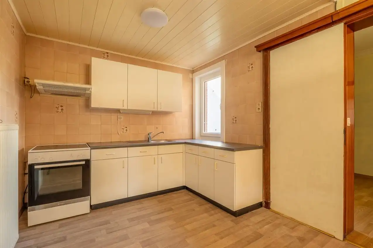 Karaktervolle woning met grote tuin, bijgebouwen en uitbreidbaar zoldervolume op een verrassend diep perceel foto 12