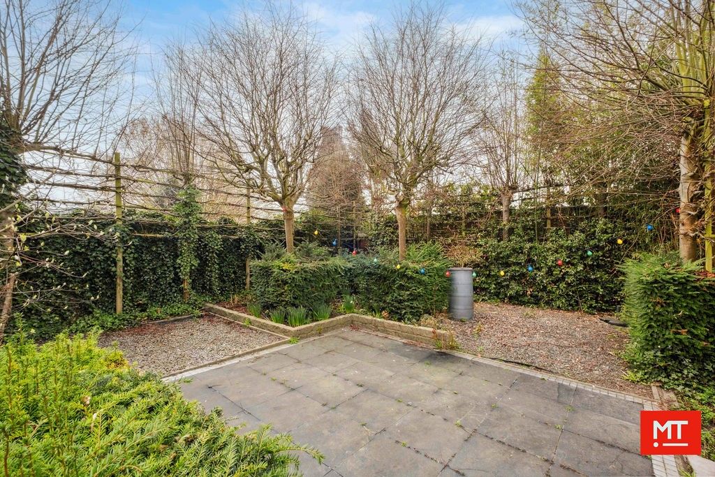 Veelzijdig gebouw bestaande uit handelsruimte, woning en appartement in het centrum van Wervik foto 5