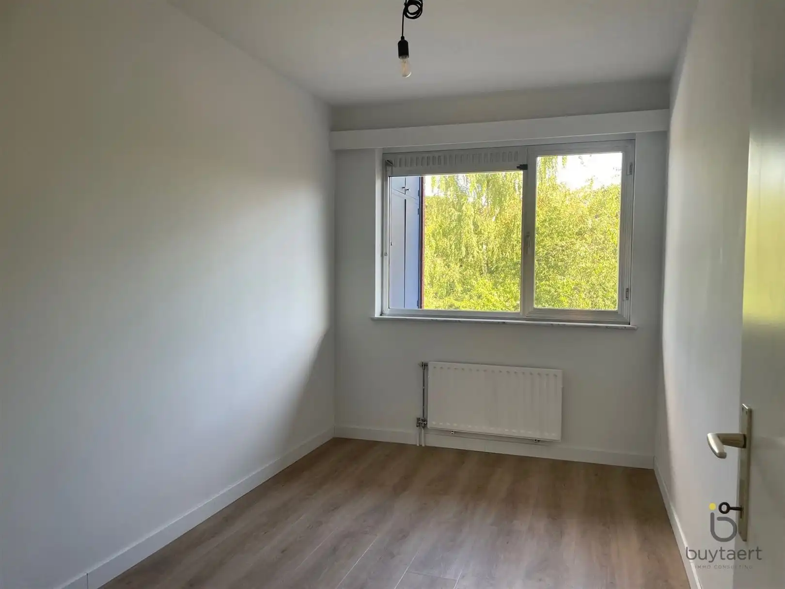 Ideaal gelegen twee (of drie) slaapkamer appartement in het hartje van Brasschaat!  foto 12