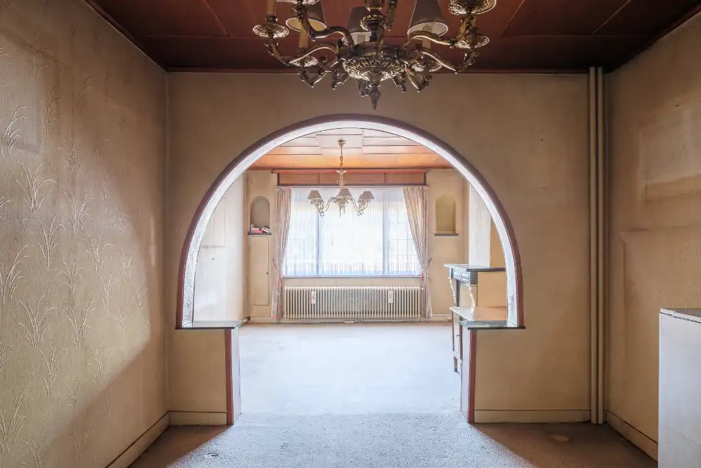 Te renoveren herenwoning met vier slaapkamers en stadstuin nabij het Keizerpark. foto 2
