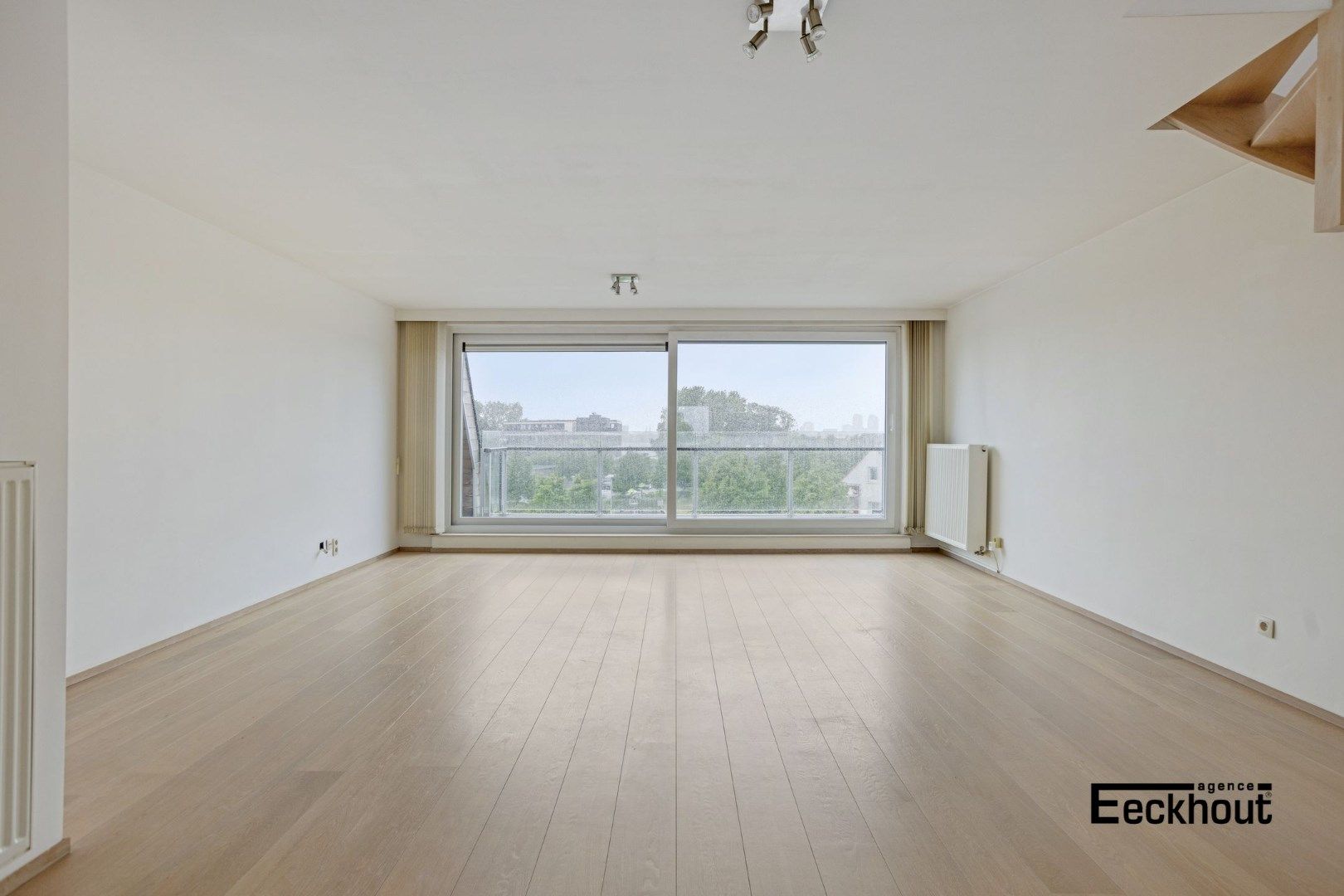 Instapklaar duplexappartement met grote terrassen en mooi open zicht! foto 2