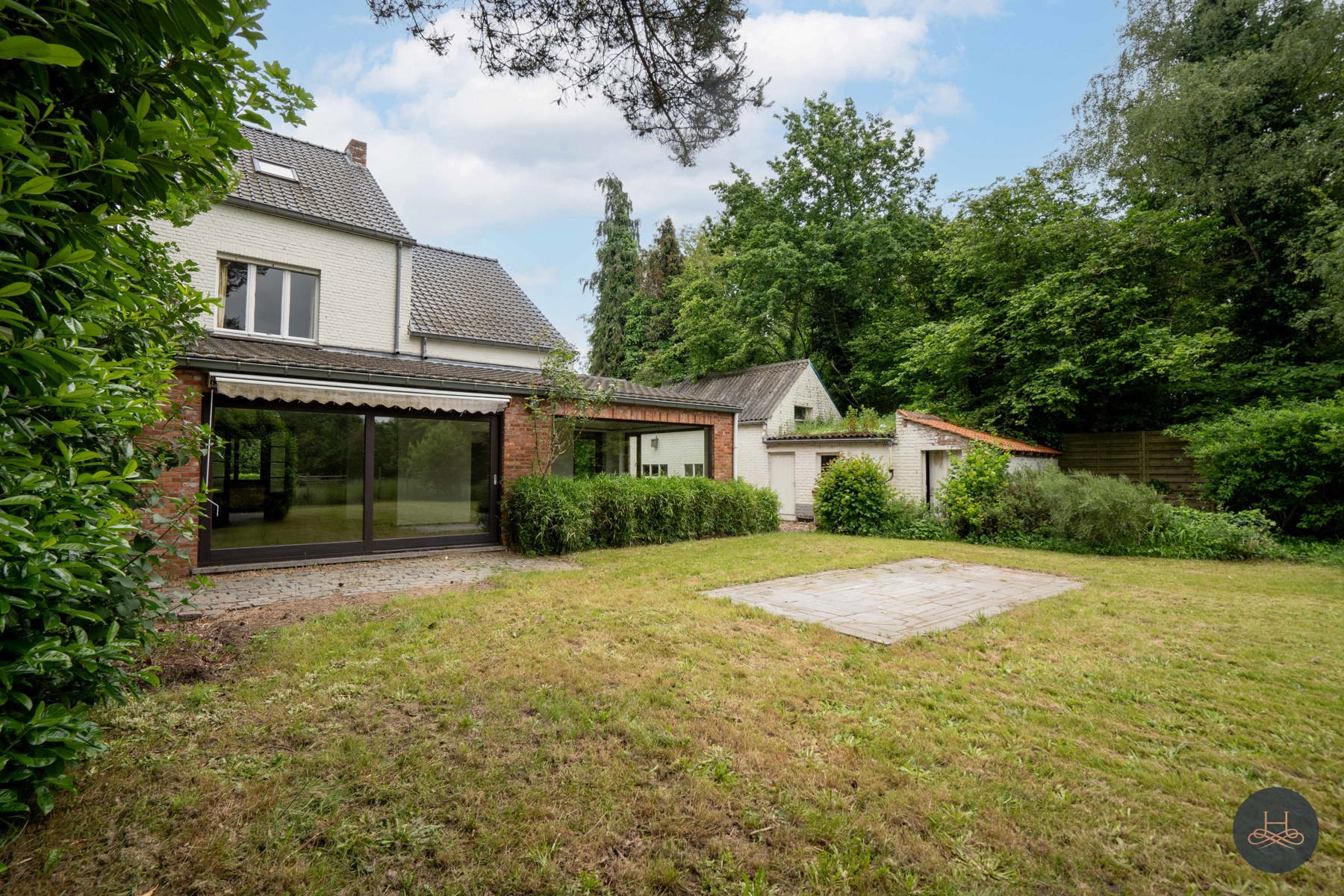 Achterliggende gezinswoning op rustgevend perceel foto 19