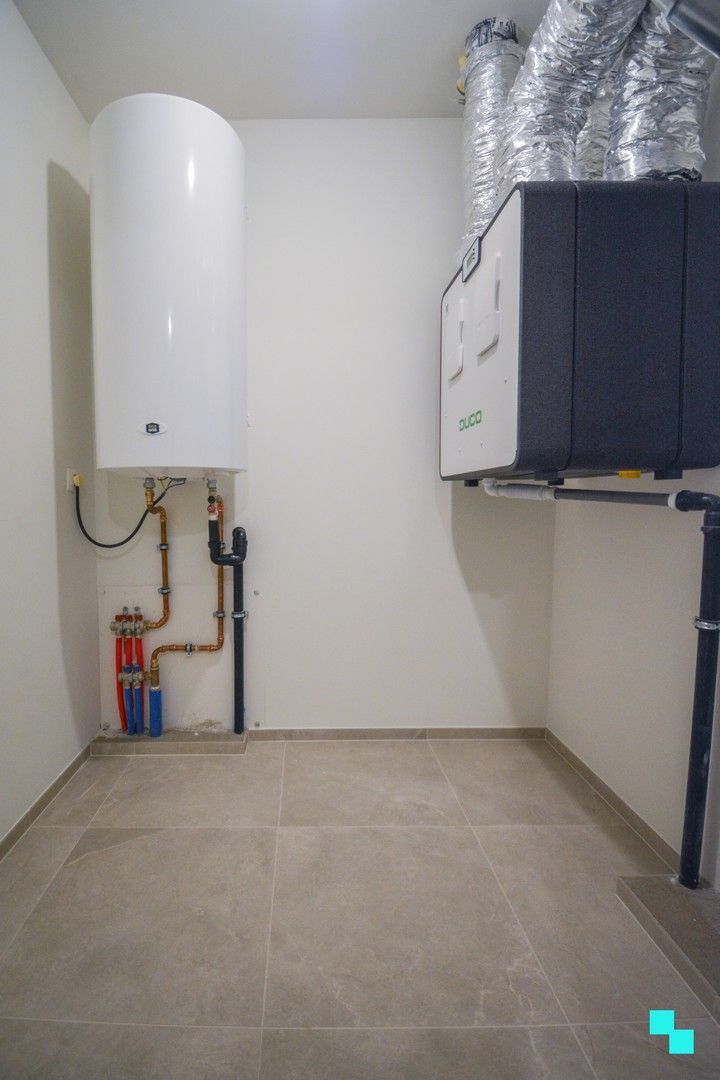 Volleidg afgewerkte nieuwbouwwoning met carport te Sleihage foto 18