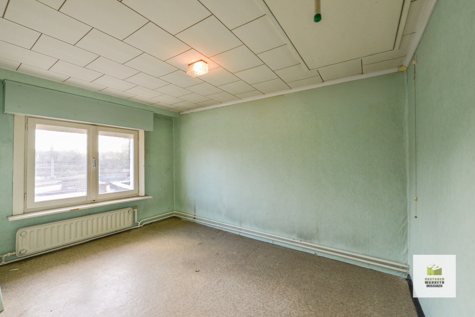 Te renoveren woning op rustige ligging met garage, tuin en 3 slaapkamers foto 14