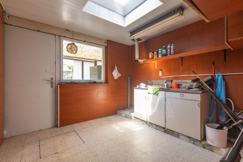 Rustig gelegen, ruime te renoveren woning met 4 slaapkamers, tuin en garage op 262m2 . foto 9