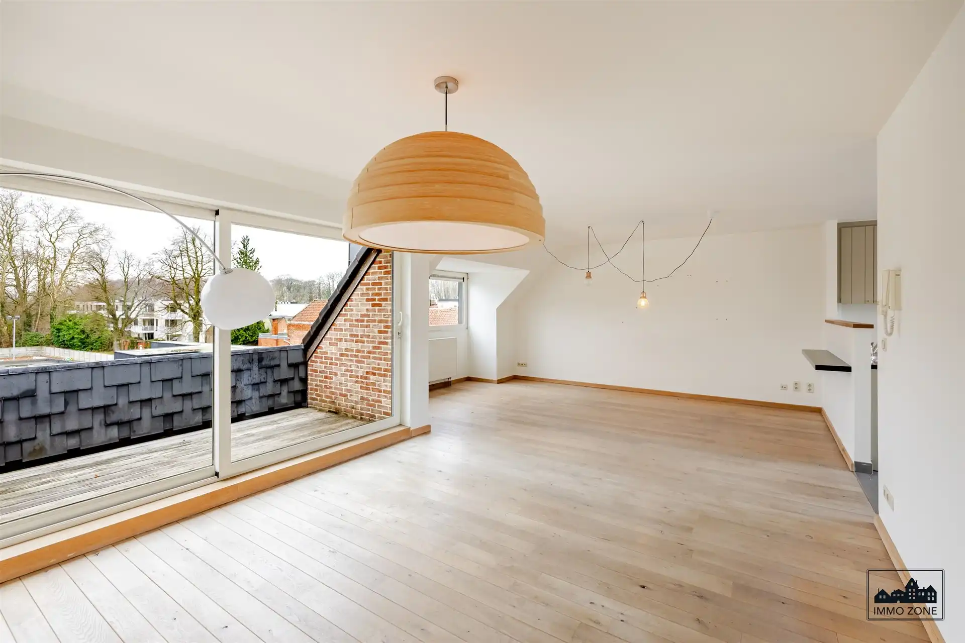 Ruim dakappartement (156 m²) met terras & garage foto 2