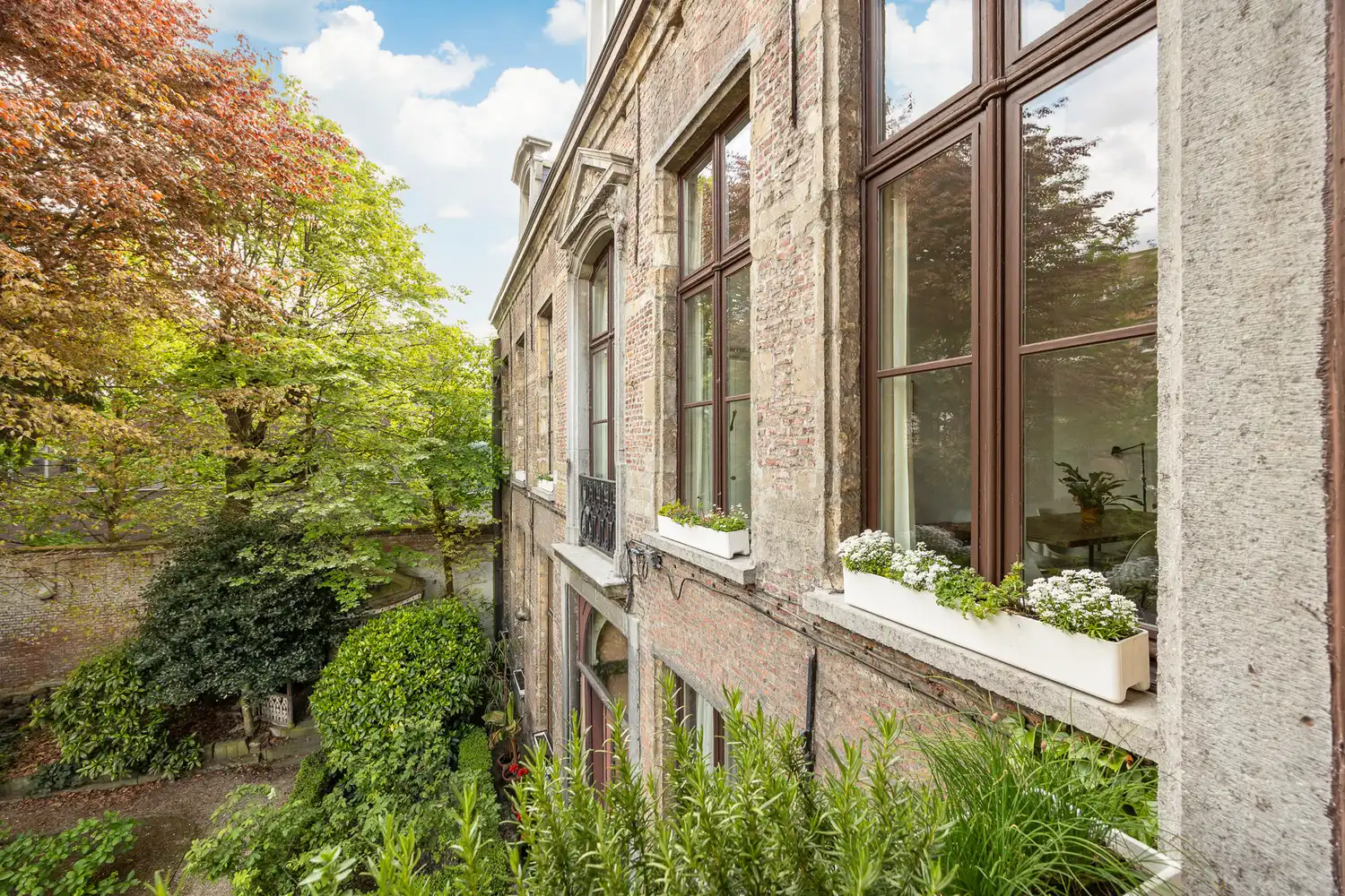 Een zeldzaam en groen privilige in het hart van Antwerpen: wonen in het historische Venushof foto 26