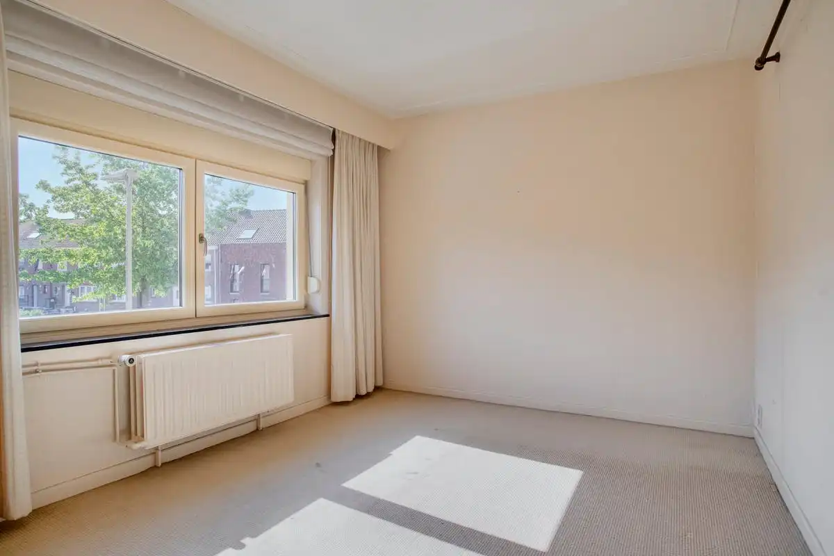 Halfopen bebouwing met 3 slaapkamers te koop in Kortrijk! foto 9