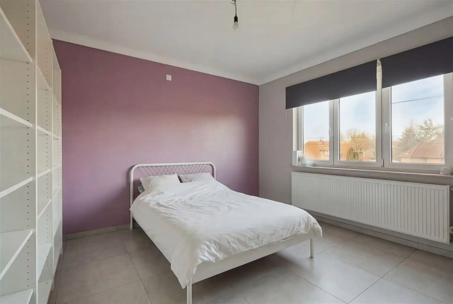 Zeer ruim 4-slaapkamerappartement met ruime terrassen en een afgesloten garage, gelegen nabij het centrum van Maaseik. foto 14