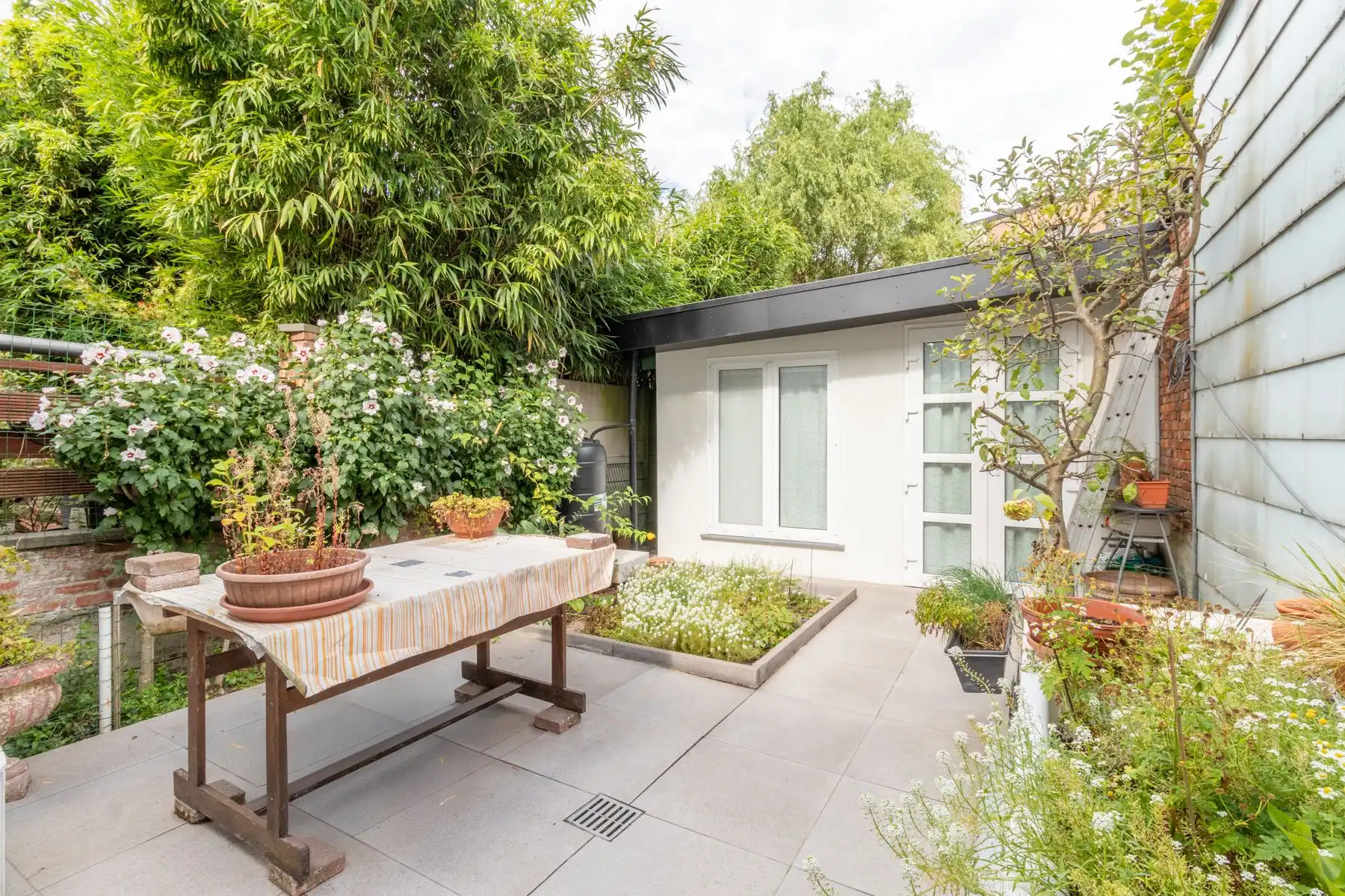 Instapklare gezinswoning met zonnige tuin foto 11