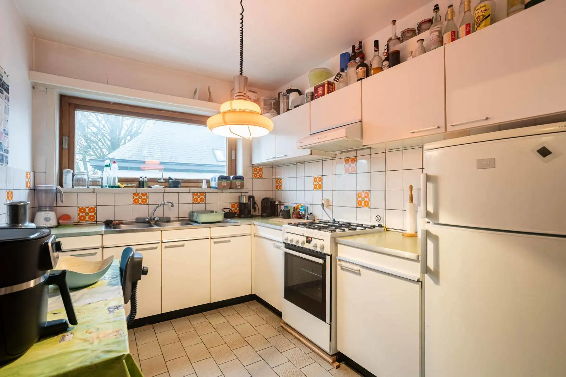 Opbrengsteigendom bestaande uit 7 appartementen en 20 garages! Toprendement met basisakte! foto 5