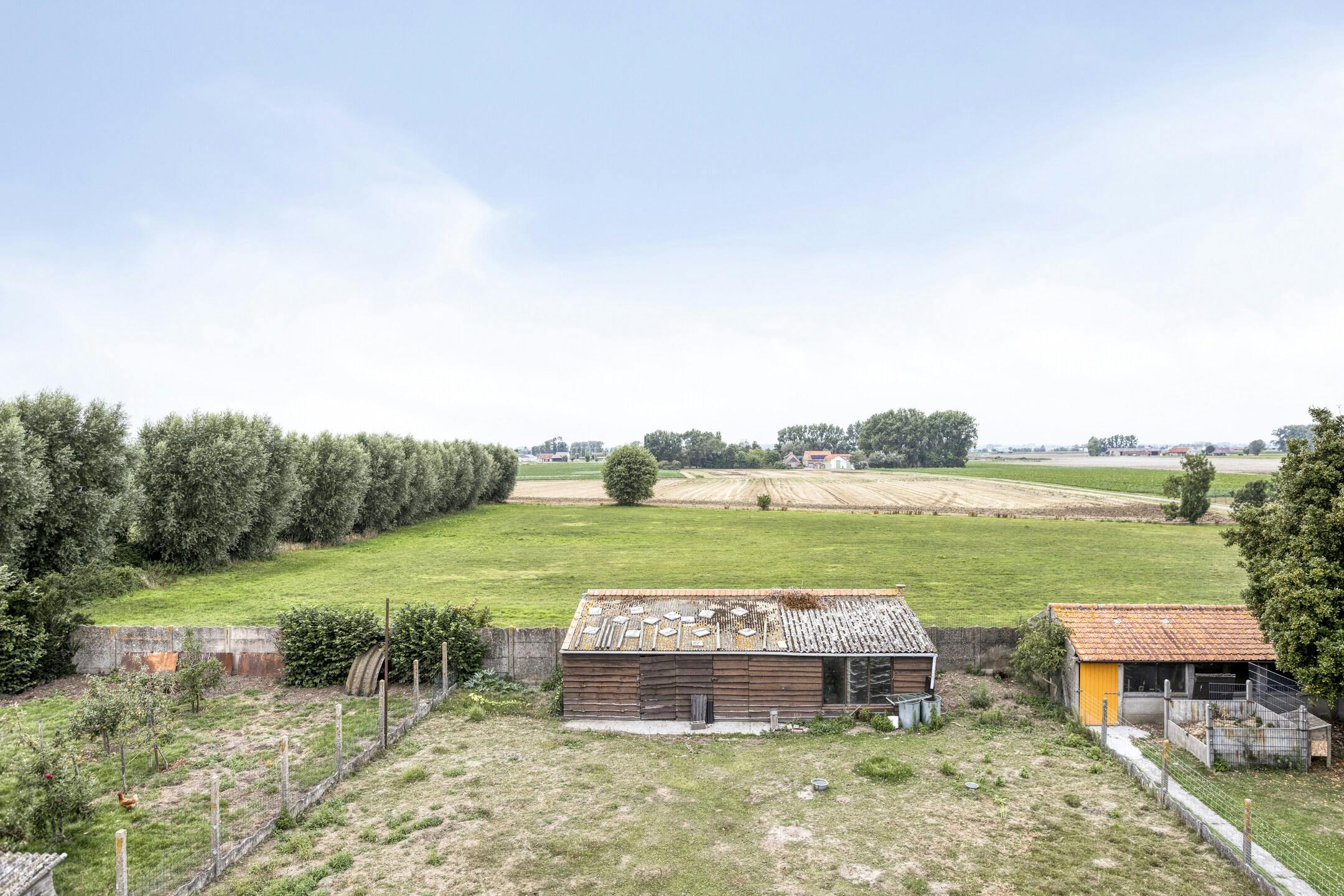 Ruime woning met tuin en garage op 1.845m² te Alveringem. foto 32