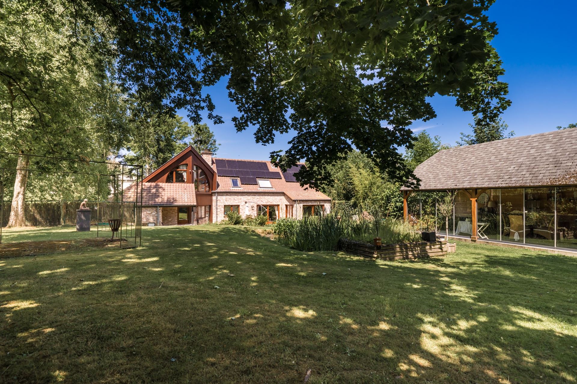 Unieke villa te koop met als troeven: Rust, ruimte en comfort in het groen foto 3