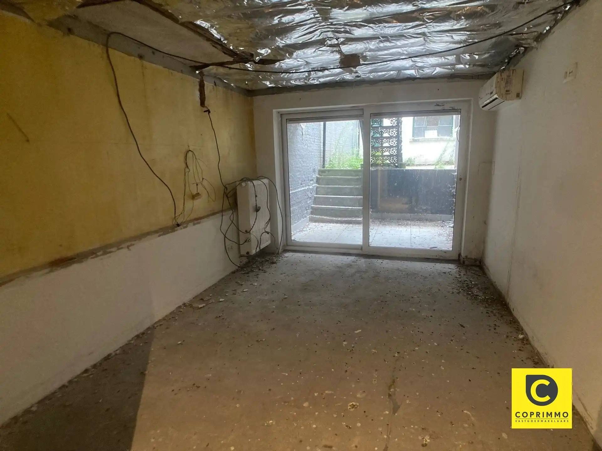 Te renoveren souterrain met stadskoer, achterhuis en garage op 't Zuid! foto 10