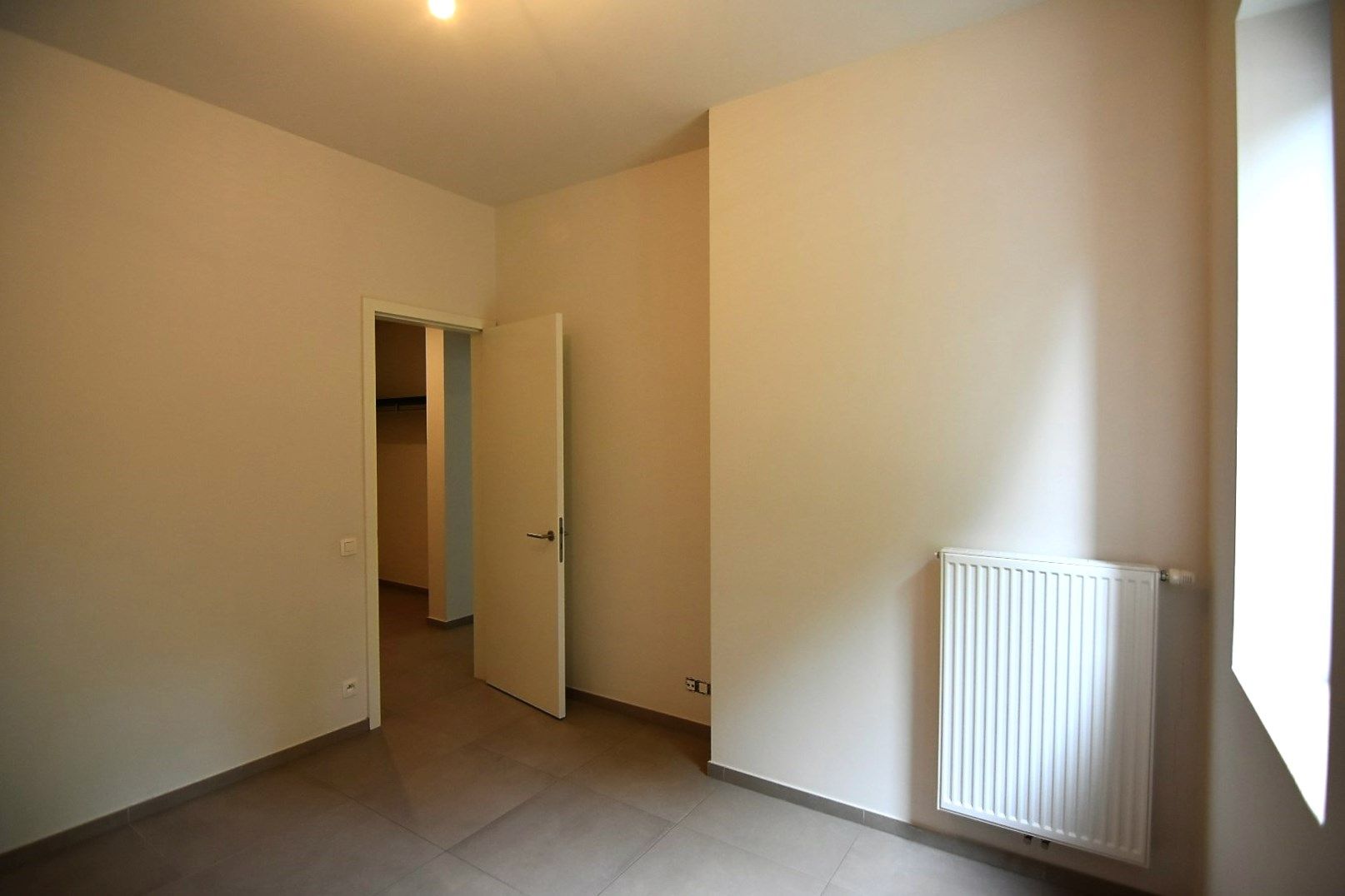 Modern gelijkvloers appartement tegenover park Pastoorsbos Beveren foto 14