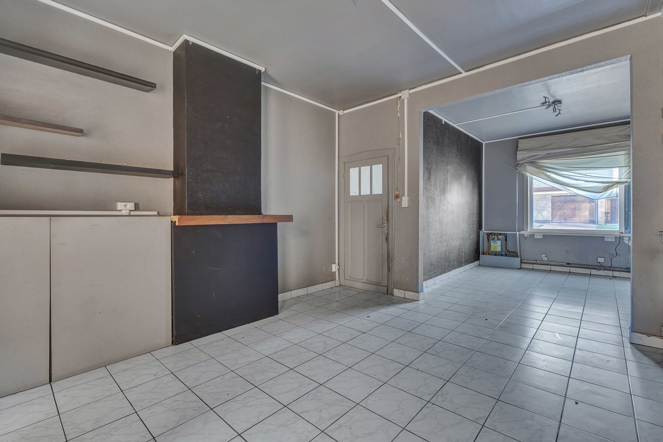 Te renoveren woning met centrale ligging in Astene/Deinze foto 4