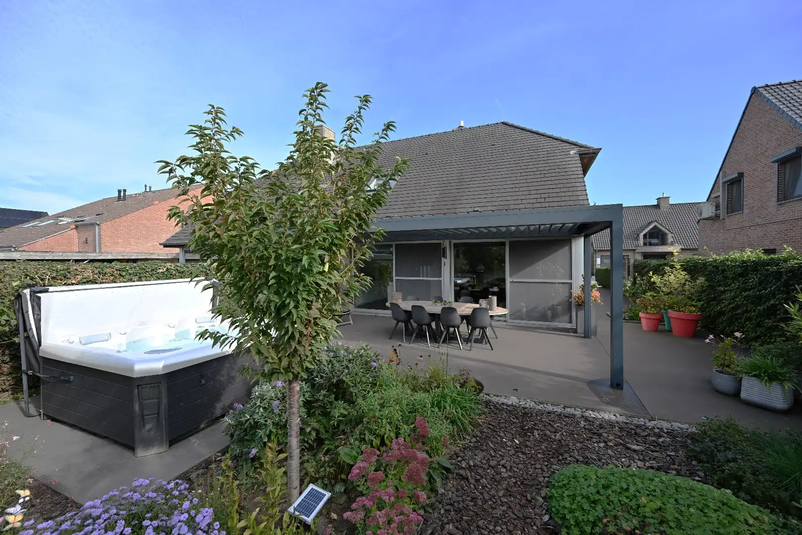 Instapklare woning met 3 slpks, garage, tuin én zonneterras te Kluizen foto 3