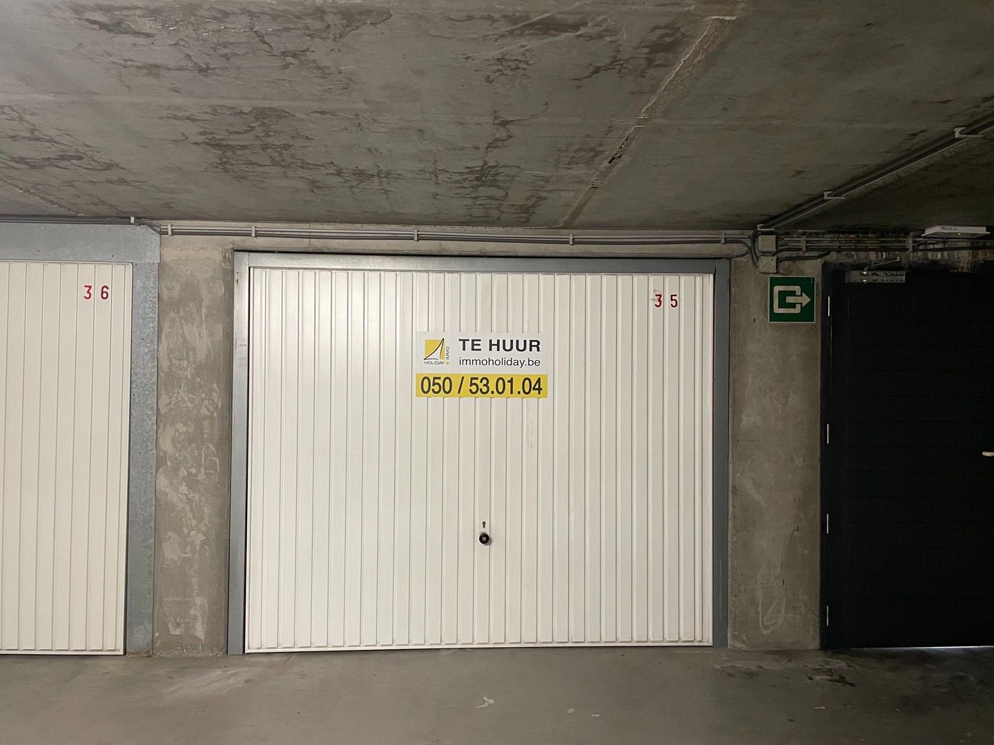 Gemakkelijk bereikbare garagebox onder de Delhaize in Heist foto 2