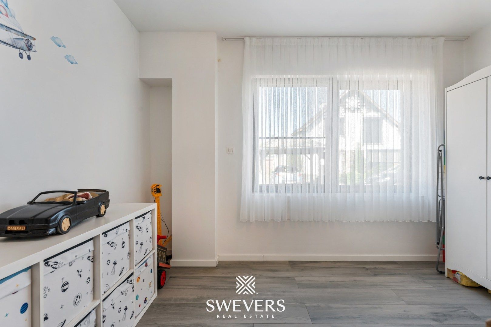 Instapklare, volledig gerenoveerde woning met zonnige tuin en grote garage foto 12