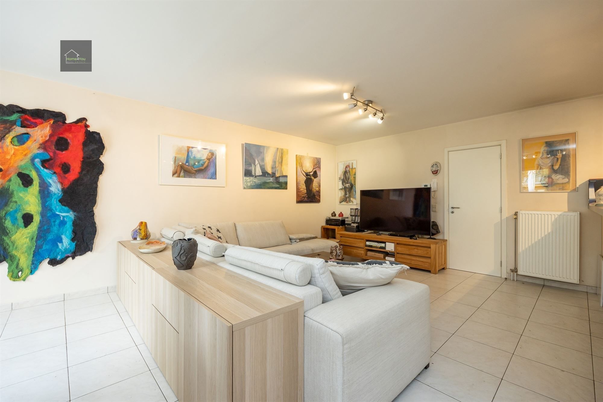 Ruim gelijkvloers appartement met tuin, parking en garagebox foto 7