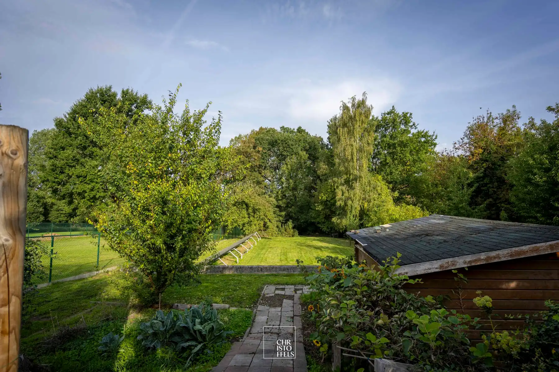 Veelzijdige woning (406 m²) met riante tuin (2510m²) op toplocatie! foto 27